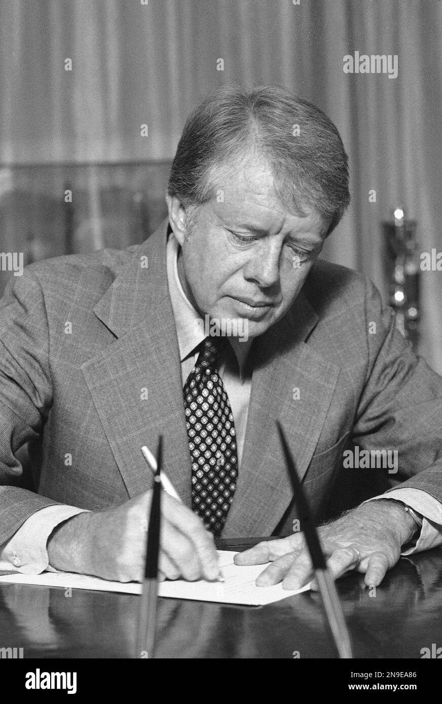 President Jimmy Carter signs a veto in the Oval Office in Washington on ...