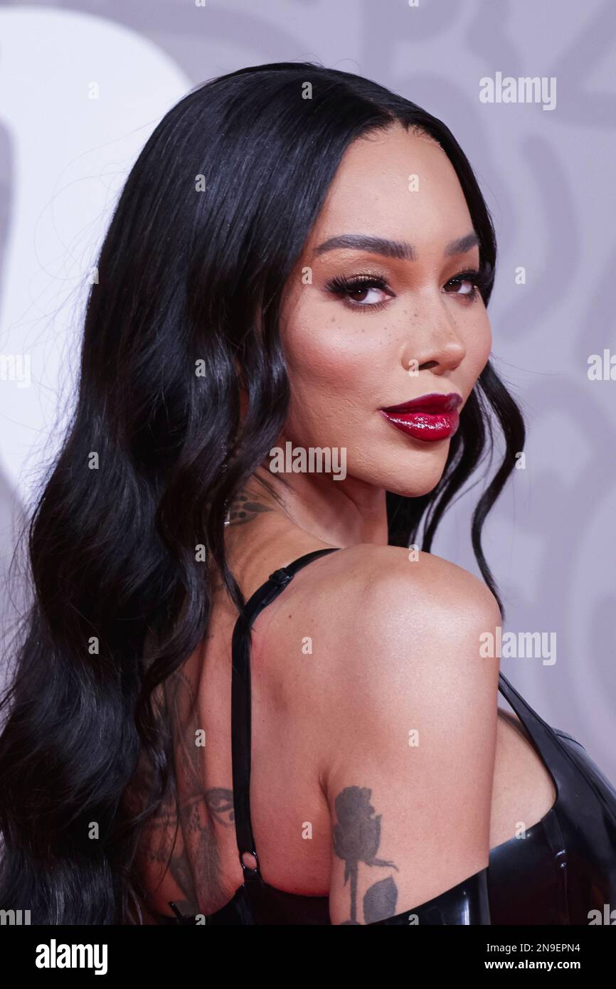 Munroe Bergdorf poses for photographers upon arrival at the Brit Awards