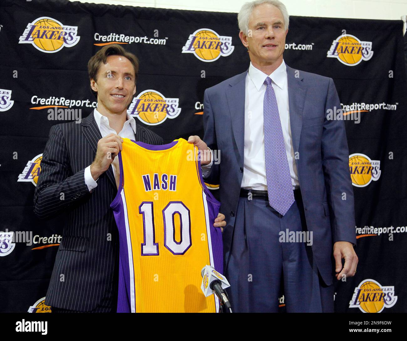 Newly acquired Los Angeles Lakers guard Steve Nash left holds