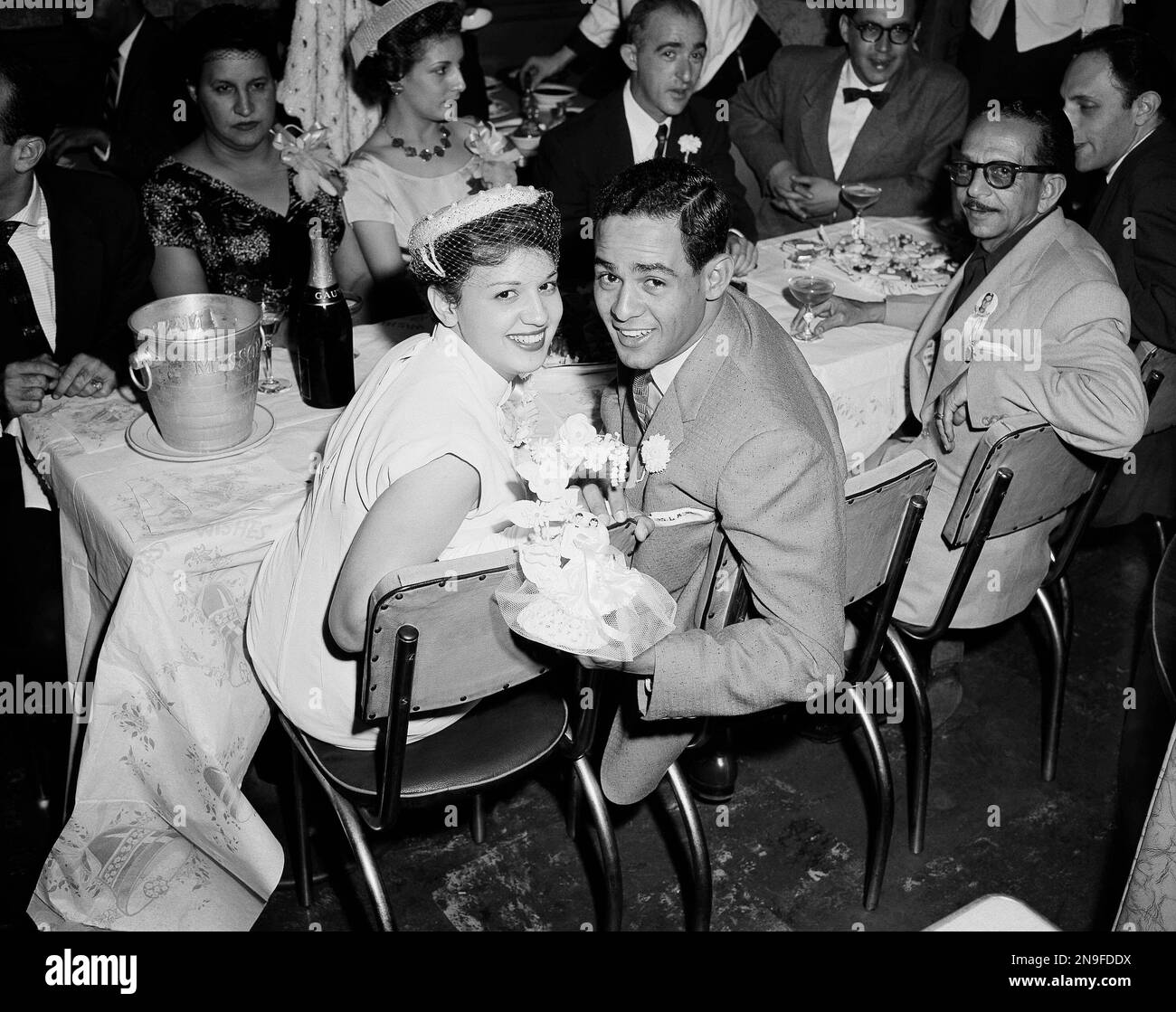 Luis Aparicio and his wife Sonia smile radiantly during reception in their  honor, celebrating their marriage of a few hours, at a New York City  restaurant, Oct. 2, 1956. Luis is rookie shortstop for the Chicago White Sox.  Mrs. Aparicio, the former Soni