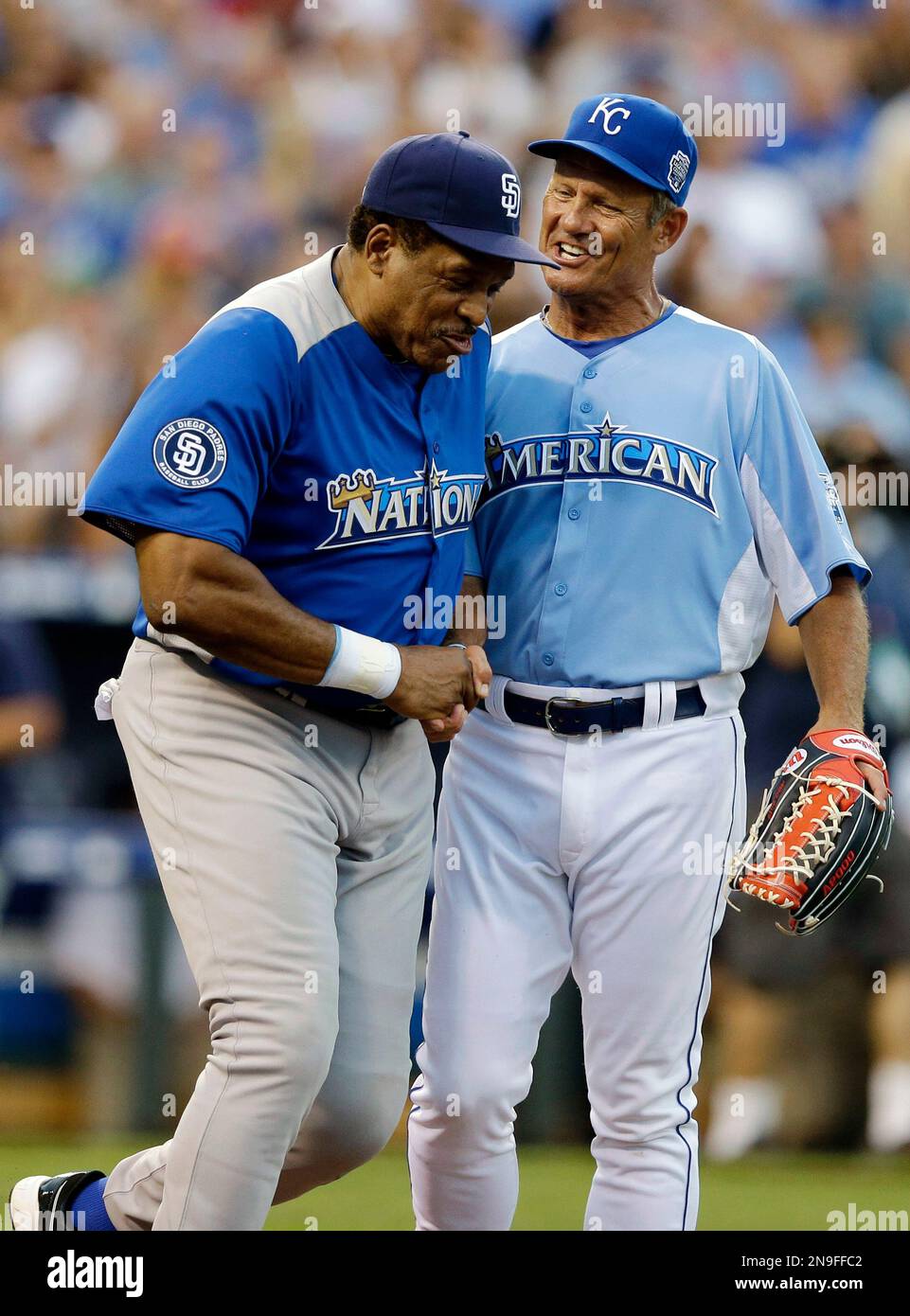 George Brett, right, congratulates Dave Winfield for his home run during  the MLB All-Star celebrity softball game Sunday, July 8, 2012, in Kansas  City, Mo. (AP Photo/Charlie Riedel Stock Photo - Alamy