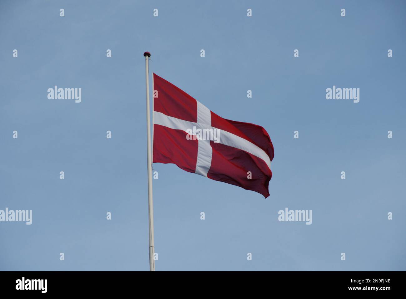 Copenhagen/Denmark/12 February 2023/ Danish media Politken hus  danish media house fly dnnebrog  danish flag on memdia house in capital Copenhagen Denmark.  (Photo. Francis Joseph Dean/Dean Pictures) Stock Photo