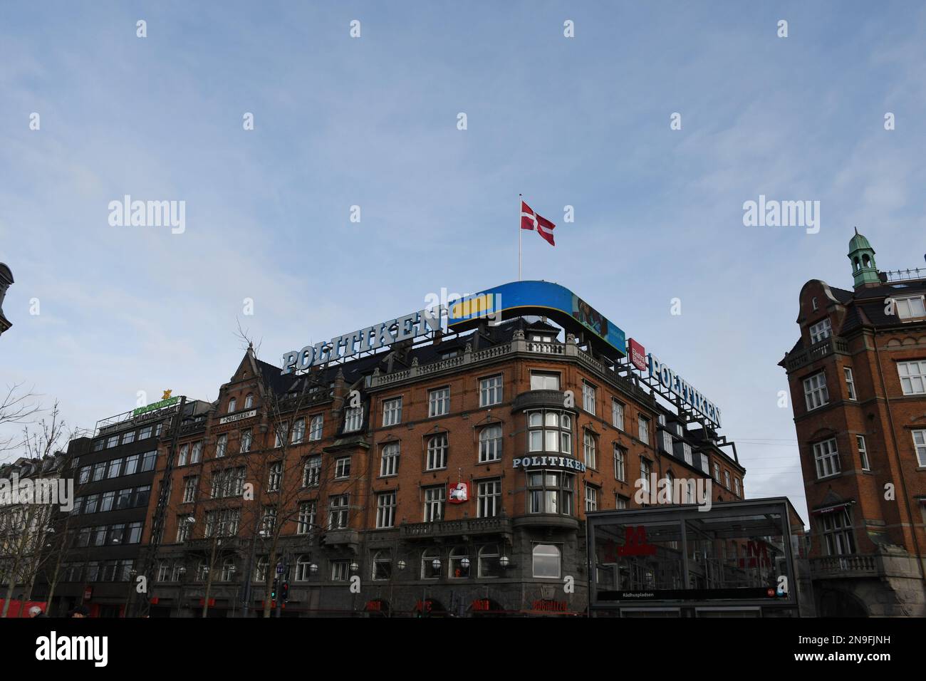 Copenhagen/Denmark/12 February 2023/ Danish media Politken hus  danish media house fly dnnebrog  danish flag on memdia house in capital Copenhagen Denmark.  (Photo. Francis Joseph Dean/Dean Pictures) Stock Photo