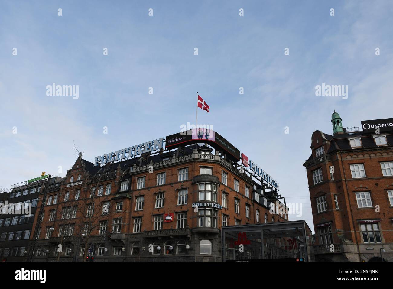 Copenhagen/Denmark/12 February 2023/ Danish media Politken hus  danish media house fly dnnebrog  danish flag on memdia house in capital Copenhagen Denmark.  (Photo. Francis Joseph Dean/Dean Pictures) Stock Photo