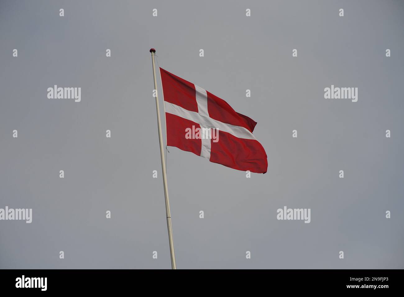 Copenhagen/Denmark/12 February 2023/ Danish media Politken hus  danish media house fly dnnebrog  danish flag on memdia house in capital Copenhagen Denmark.  (Photo. Francis Joseph Dean/Dean Pictures) Stock Photo