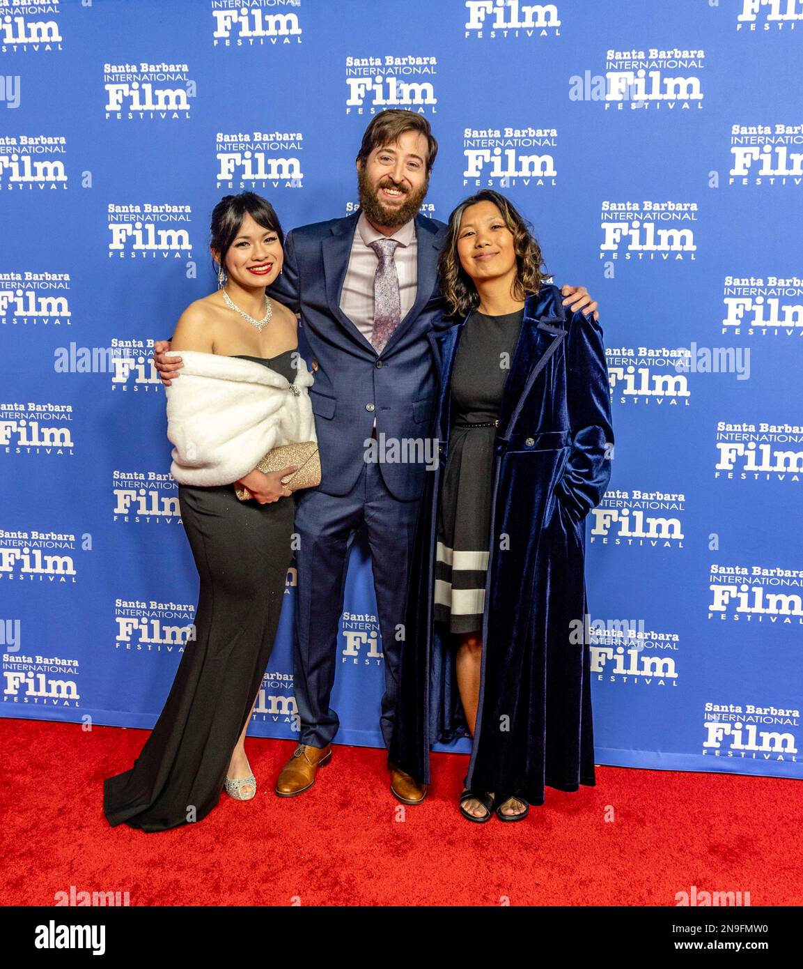 Santa Barbara, USA. 11th Feb, 2023. (l-r) Chrisna Chhor, Frank Martinez and Caylee So (The Harvest) arrive at the 2023 Santa Barbara International Film Festival red carpet event to honor Jamie Lee Curtis with the Maltin Modern Master Award at the Arlington Theatre on February 11, 2023 in Santa Barbara, CA. (Photo by Rod Rolle/Sipa USA) Credit: Sipa USA/Alamy Live News Stock Photo