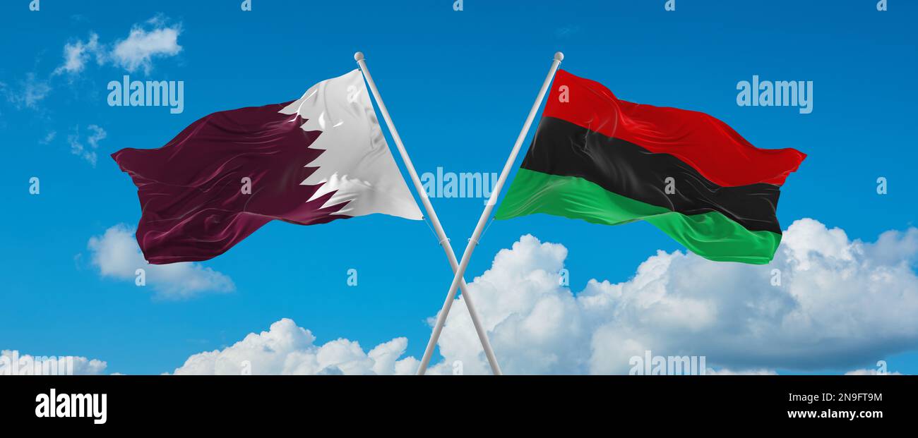 two crossed flags Pan-African and Qatar waving in wind at cloudy sky ...