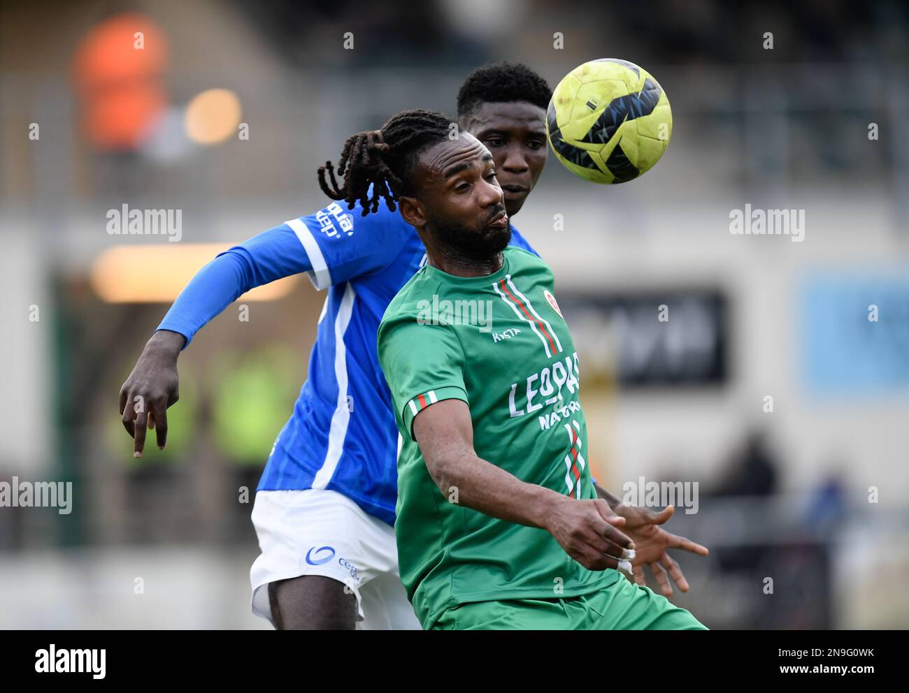 Virton's Illombe Mboyo and Jong Genk's Ibrahima Sory Bangoura fight for the ball during a soccer match between RE Virton and Jong Genk, Sunday 12 February 2023 in Virton, on day 22 of the 2022-2023 'Challenger Pro League' 1B second division of the Belgian championship. BELGA PHOTO JOHN THYS Stock Photo