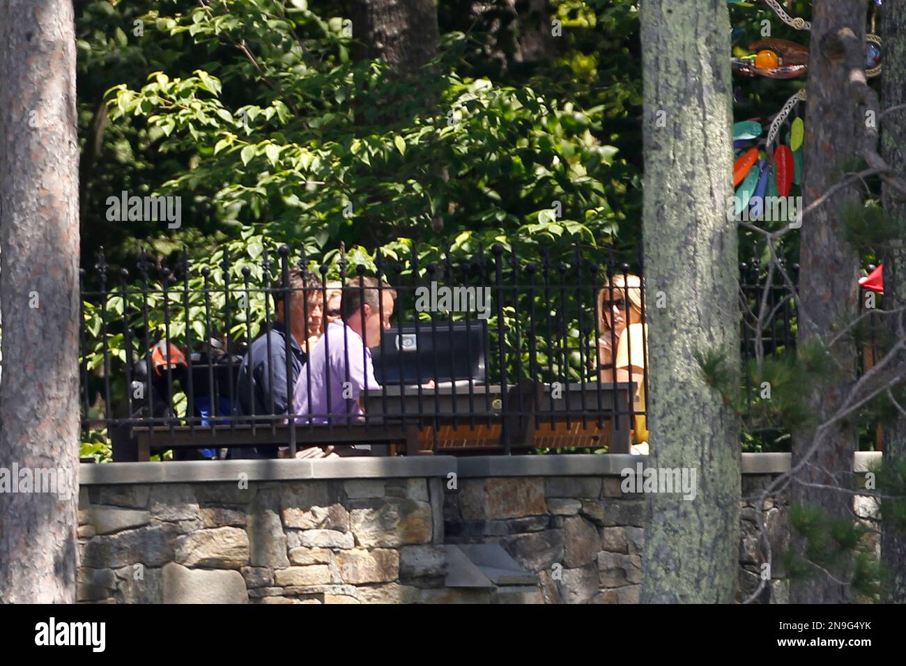 Republican presidential candidate Mitt Romney, left, sits with campaign manager Matt Rhoades and