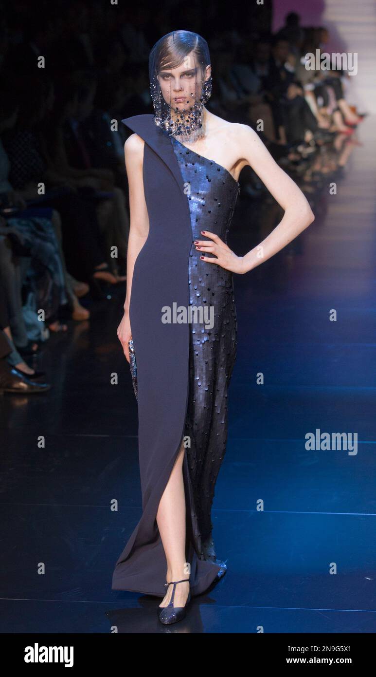 A model wears a creation by Italian designer Giorgio Armani as part of his  presentation for Women's Fall Winter 2013 haute couture fashion collection,  in Paris, France, Tuesday, July 3, 2012. (AP, image size:773x1390