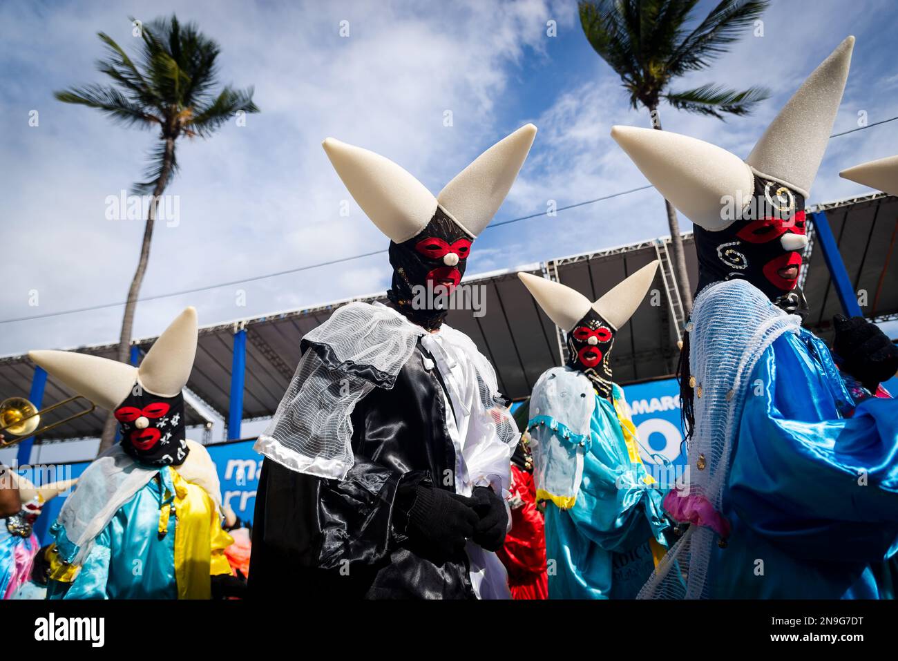 Salvador, Bahia, Brazil - February 11, 2023: Costumed people dance and play  in the street during the pre-carnival Fuzue parade in the city of Salvador  Stock Photo - Alamy