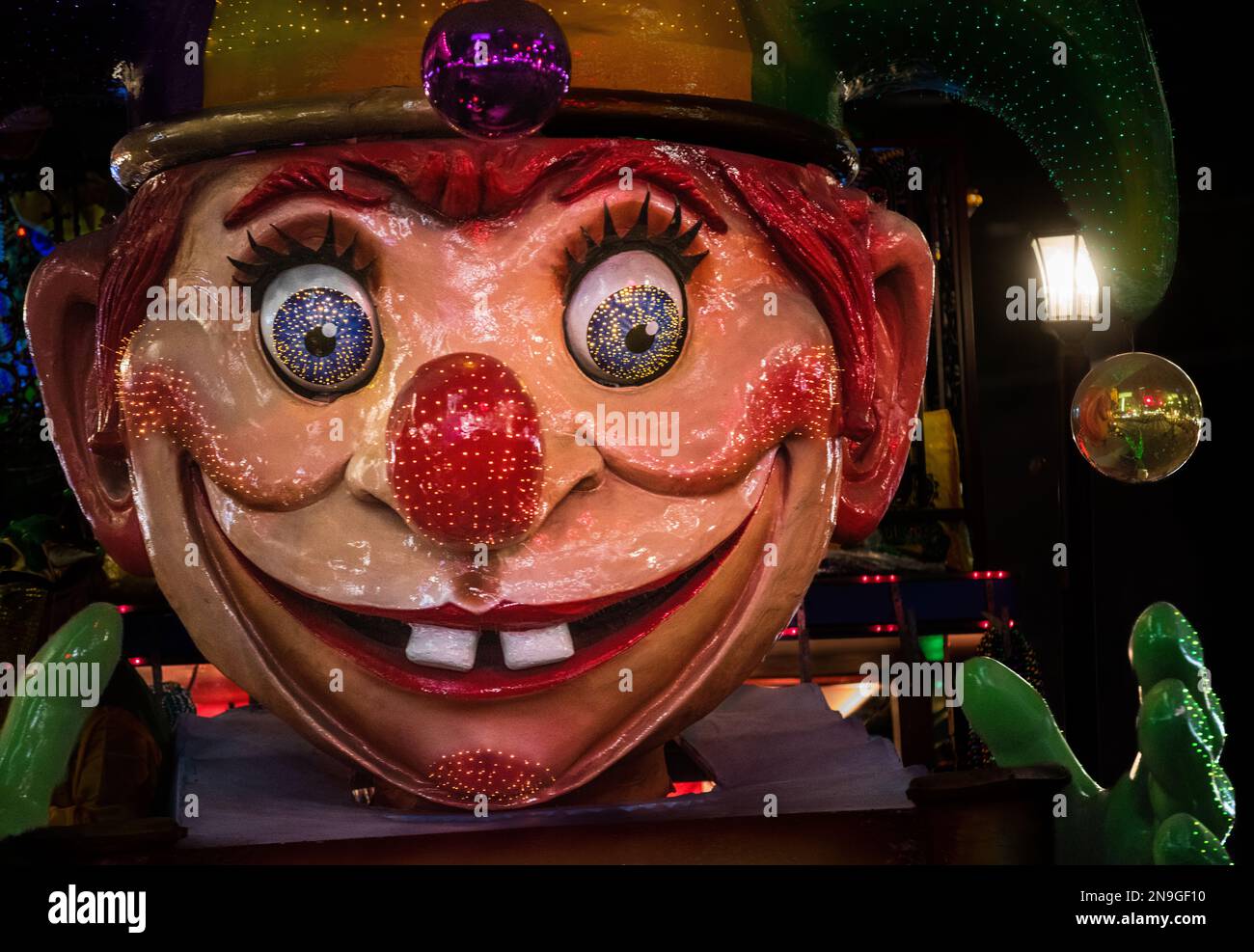 Large clown face heading a float of Krewe of Endymion during Mardis Gras in New Orleans, 2019 Stock Photo