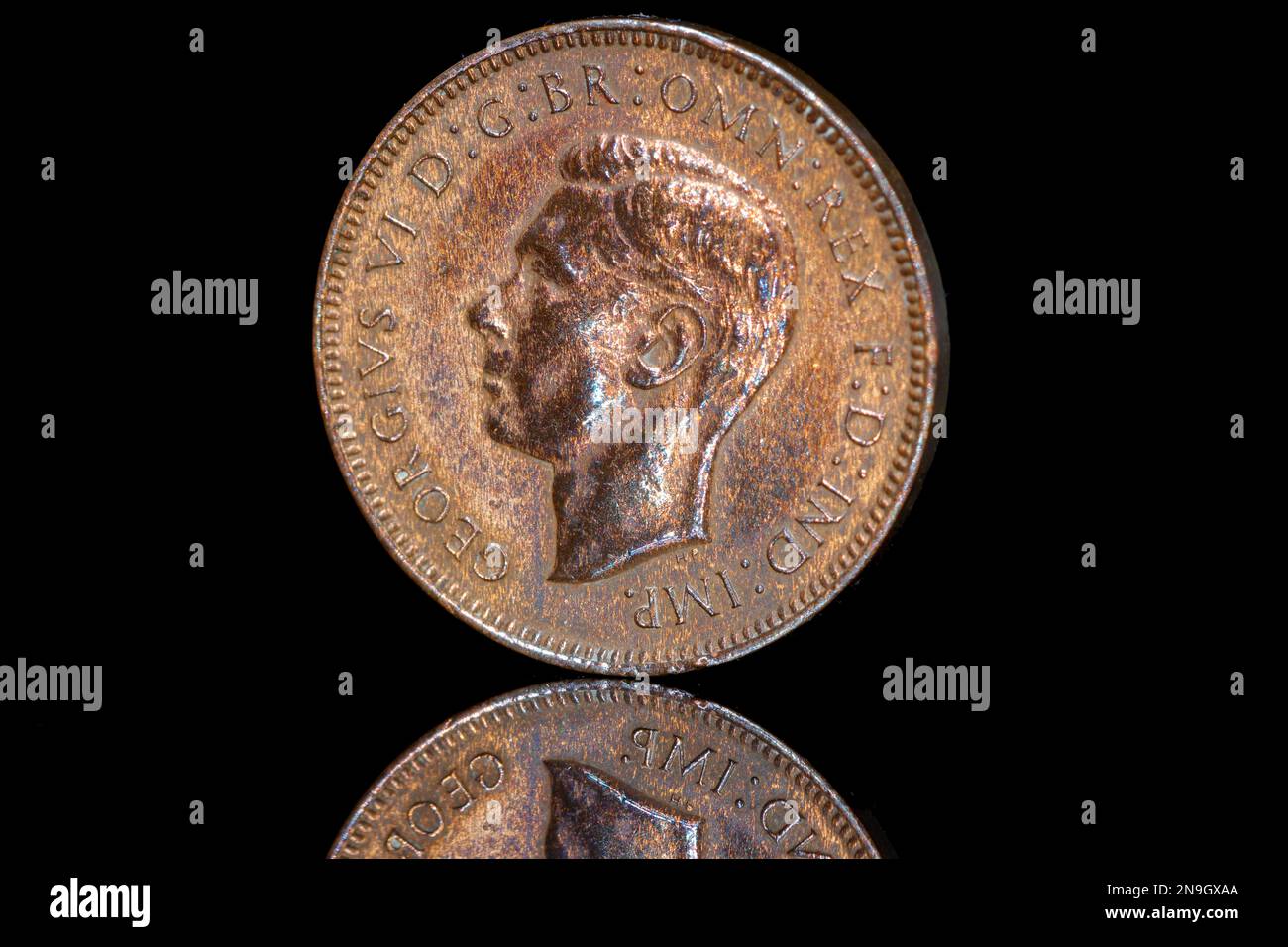 A 1939 Farthing coin featuring George VI portrait Stock Photo
