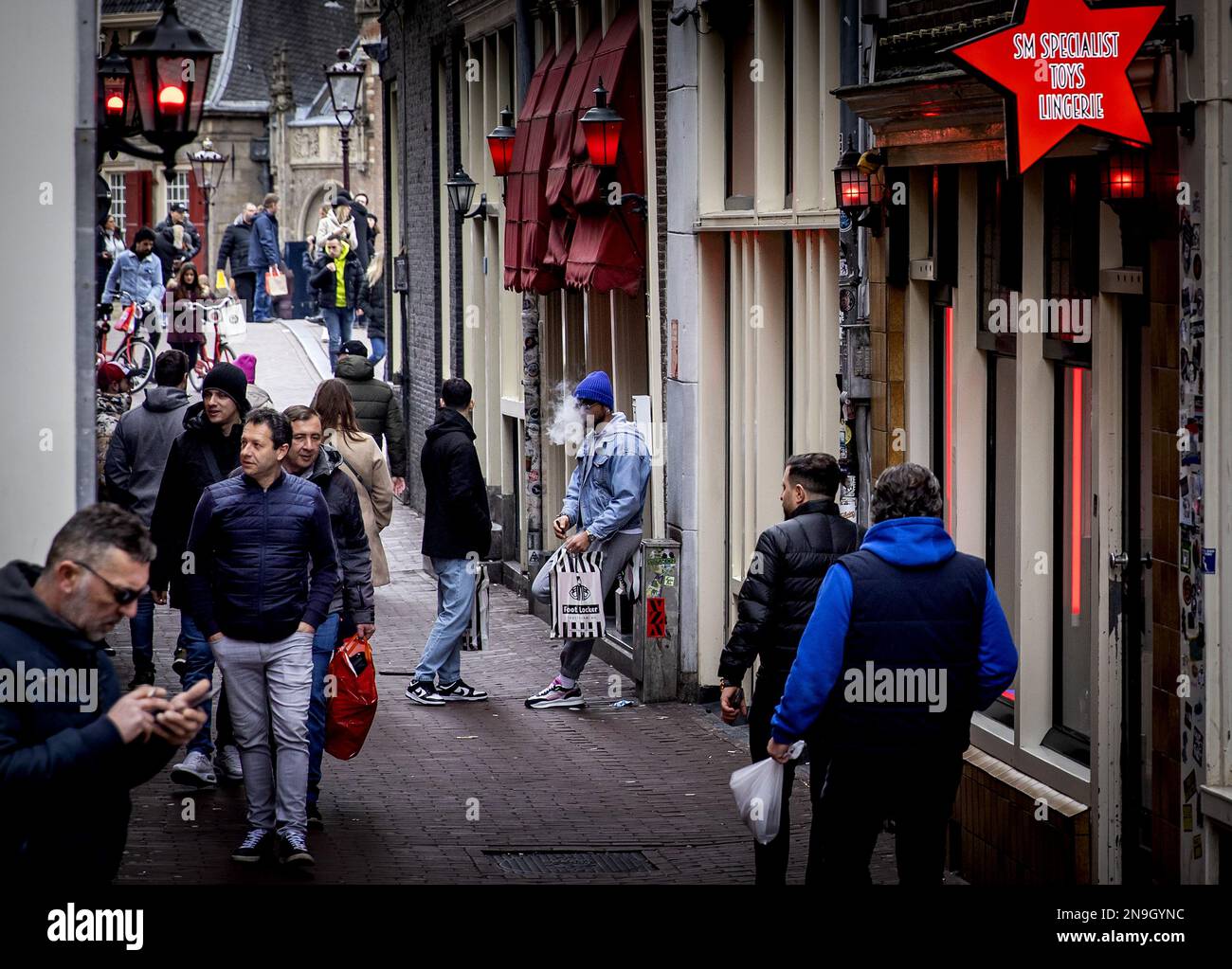 AMSTERDAM Tourists in the Red Light District. In the fight against