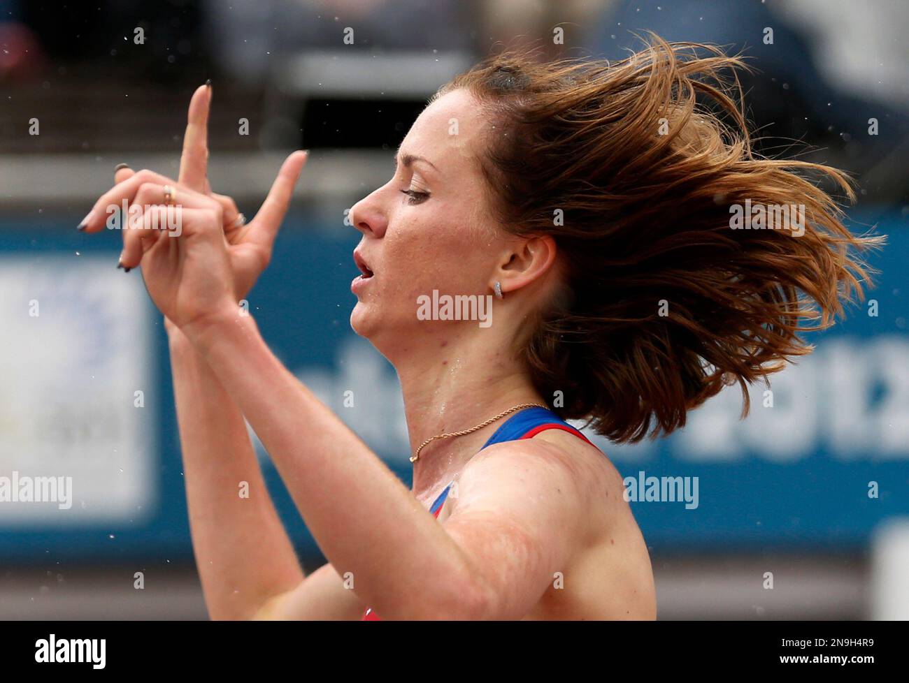 Russia's Olga Golovkina crosses the finish line to win the Women's 5000