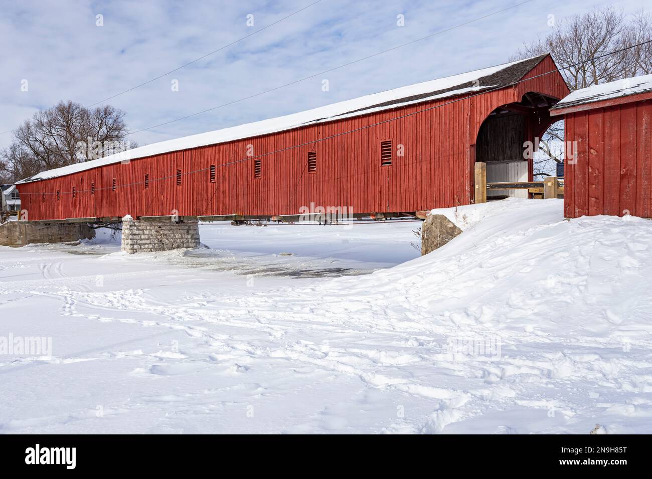 North of Kitchener, Ontario, the West Montrose Covered Bridge (also known as the Kissing Bridge) is one of the oldest of its kind in Canada.  It's 198 Stock Photo