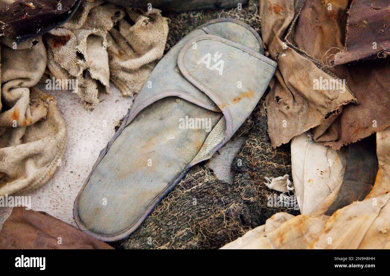 https://c8.alamy.com/comp/2N9H8HH/file-in-this-file-photo-of-june-19-2011-an-american-airlines-slipper-is-stored-in-hangar-17-at-john-f-kennedy-international-airport-in-new-york-the-slipper-is-an-artifact-from-the-september-11-2001-attacks-that-is-to-be-part-of-the-national-september-11-museum-a-group-of-911-family-members-on-wednesday-june-27-2012-accused-the-governors-of-new-york-and-new-jersey-of-betraying-the-people-killed-in-the-2001-terrorist-attacks-urging-them-to-resolve-a-financial-disagreement-that-has-hobbled-construction-of-the-ground-zero-museum-meant-to-memorialize-those-lost-ap-photomark-lennihan-2N9H8HH.jpg