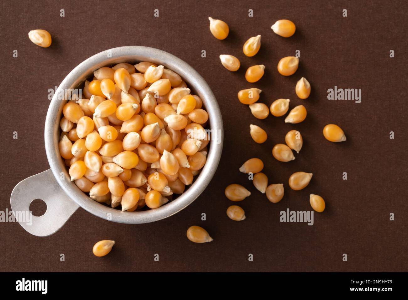 Unpopped Popcorn in a Vintage Measuring Cup Stock Photo Alamy