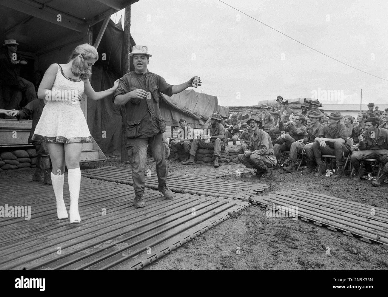 Bellinda Myrick dances with a GI during a U.S.O. show at Firebase Mace