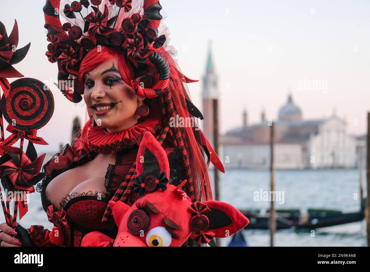 A masked reveller takes part in the Venice carnival in Venice, Italy, February 14, 2023. Stock Photo