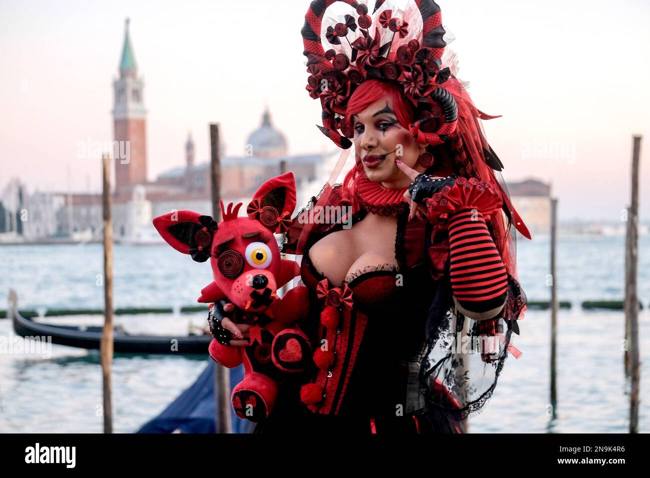 A masked reveller takes part in the Venice carnival in Venice, Italy, February 14, 2023. Stock Photo