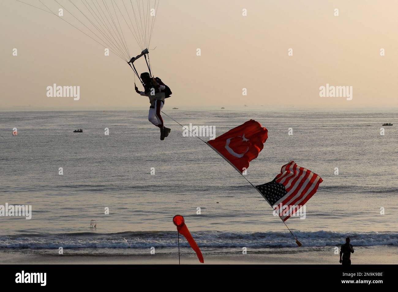 A member of the Pakistan Navy's special force parachutes with the