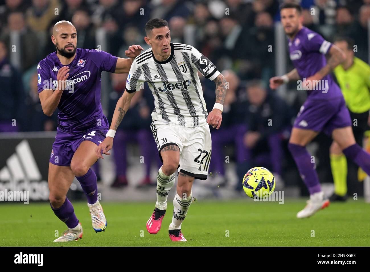 Dusan Vlahovic of Juventus and Christiano Biraghi of Acf Fiorentina during  the Italian serie A, football match between Juventus Fc and Acf Fiorentina  on 12 February 2023 at Allianz Stadium, Turin, Italy.