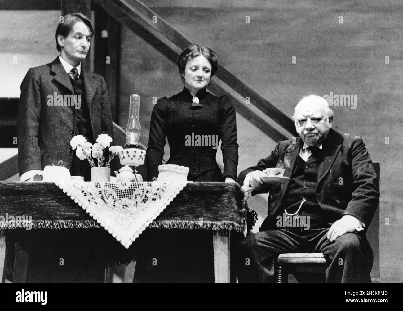 l-r: Ronald Pickup (William Mossop), Julia McKenzie (Maggie Hobson), Arthur Lowe (Henry Horatio Hobson) in HOBSON'S CHOICE by Harold Brighouse at the Lyric Theatre Hammersmith, London W6  02/02/1981  set design: Kenneth Mellor  costumes: Mark Negin  lighting: Mark Dawson  director: David Giles Stock Photo