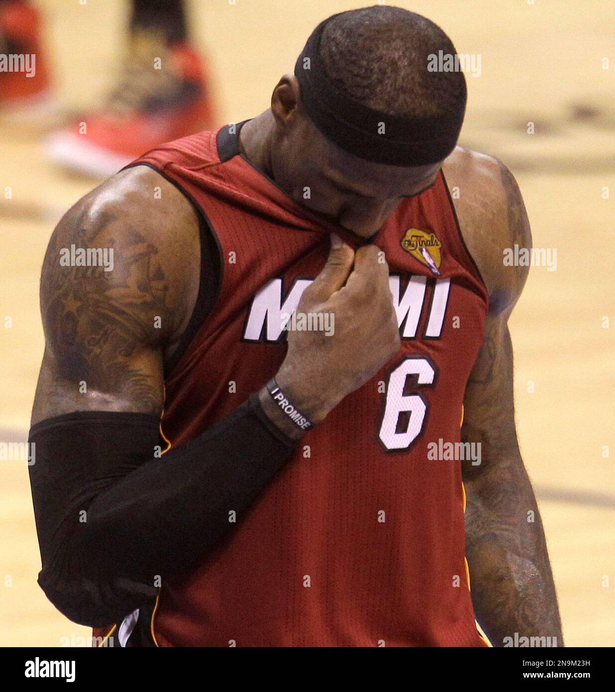 Miami Heat small forward LeBron James pauses between plays against the Oklahoma City Thunder during the second half at Game 1 of the NBA finals basketball series, Tuesday, June 12, 2012, in Oklahoma City. (AP Photo/Sue Ogrocki) Stock Photo