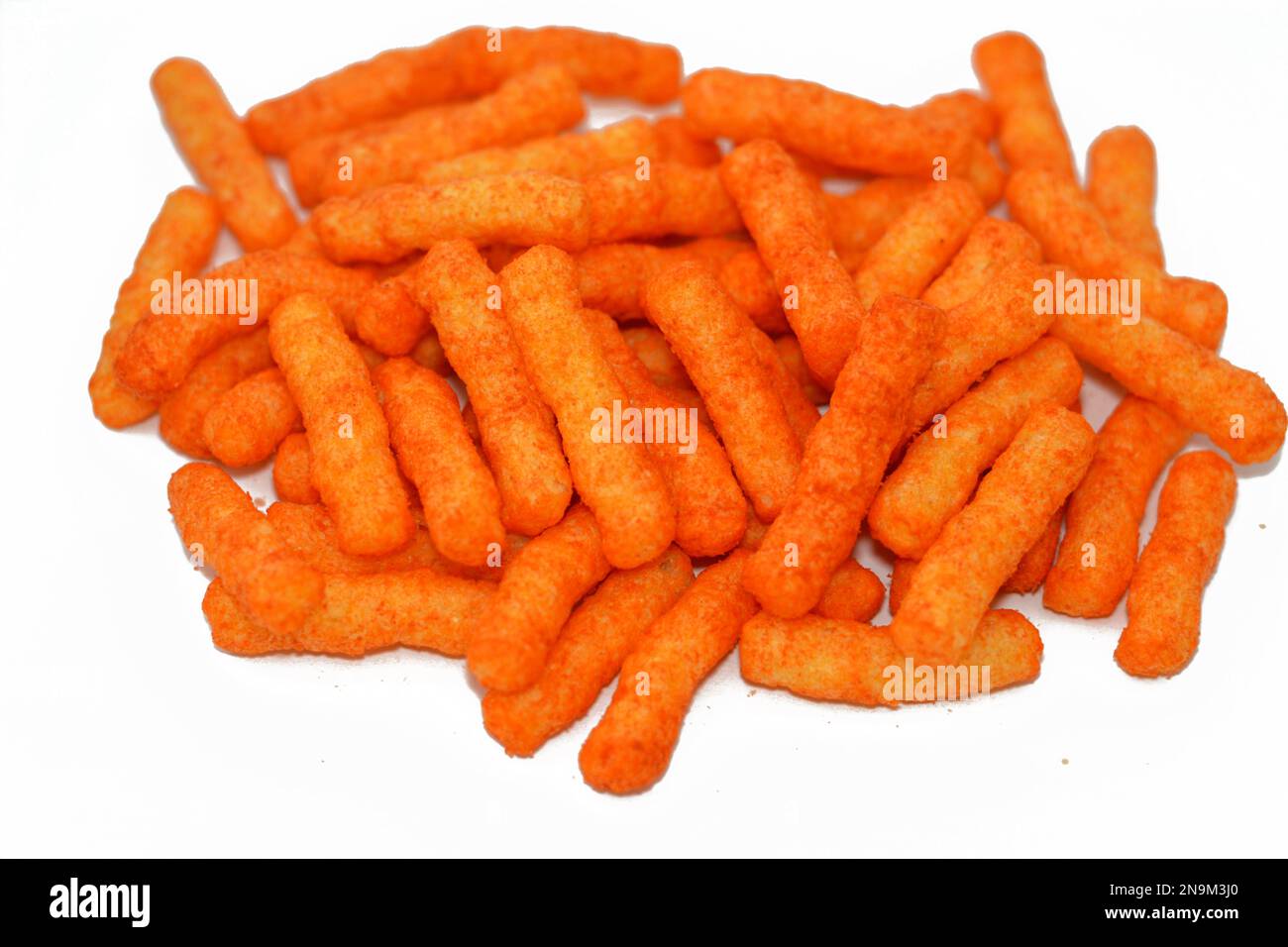 Enriched corn meal that contain flavors and milk ingredients with oil