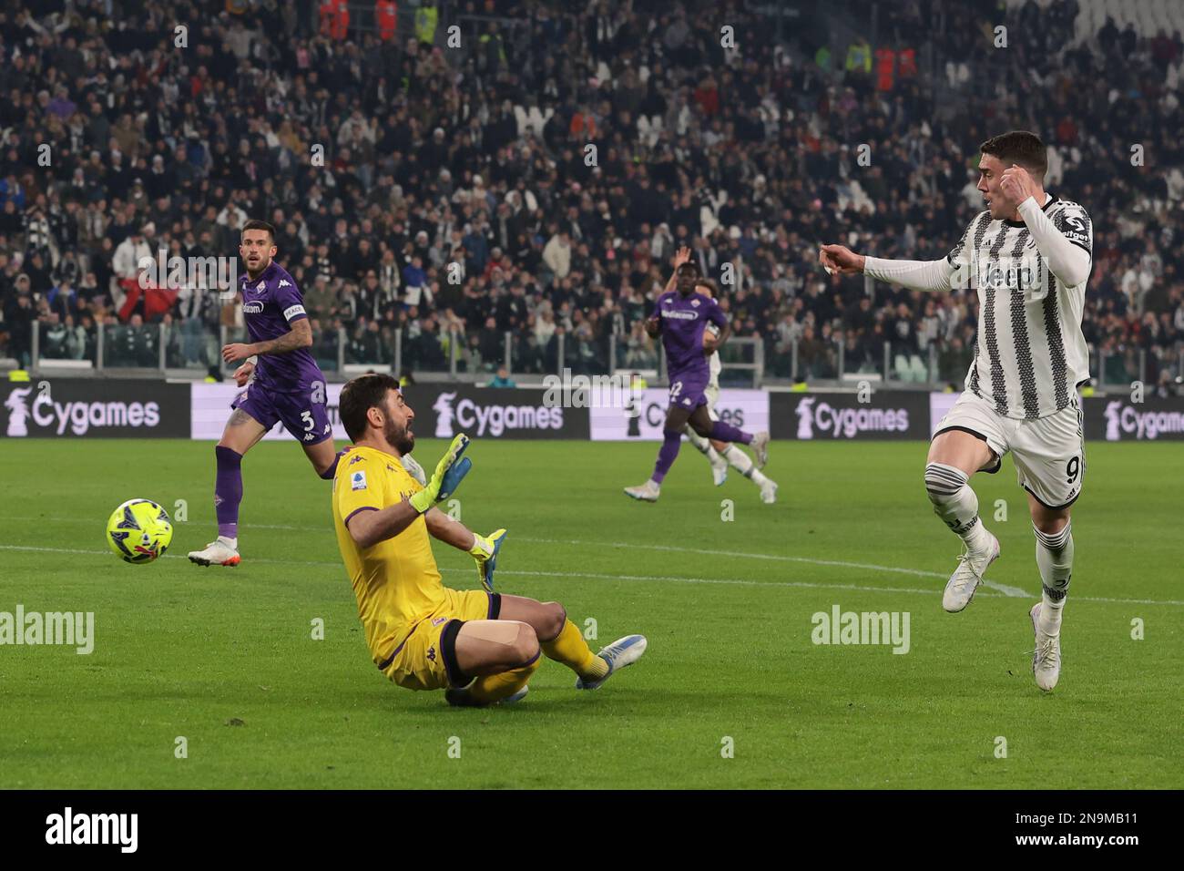 Dusan Vlahovic of Juventus and Christiano Biraghi of Acf Fiorentina during  the Italian serie A, football match between Juventus Fc and Acf Fiorentina  on 12 February 2023 at Allianz Stadium, Turin, Italy.