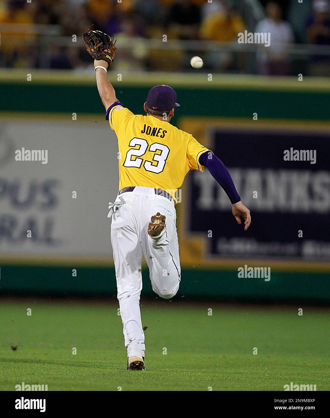 Lsu infielder jacoby jones 23 chases a blooper single to center by