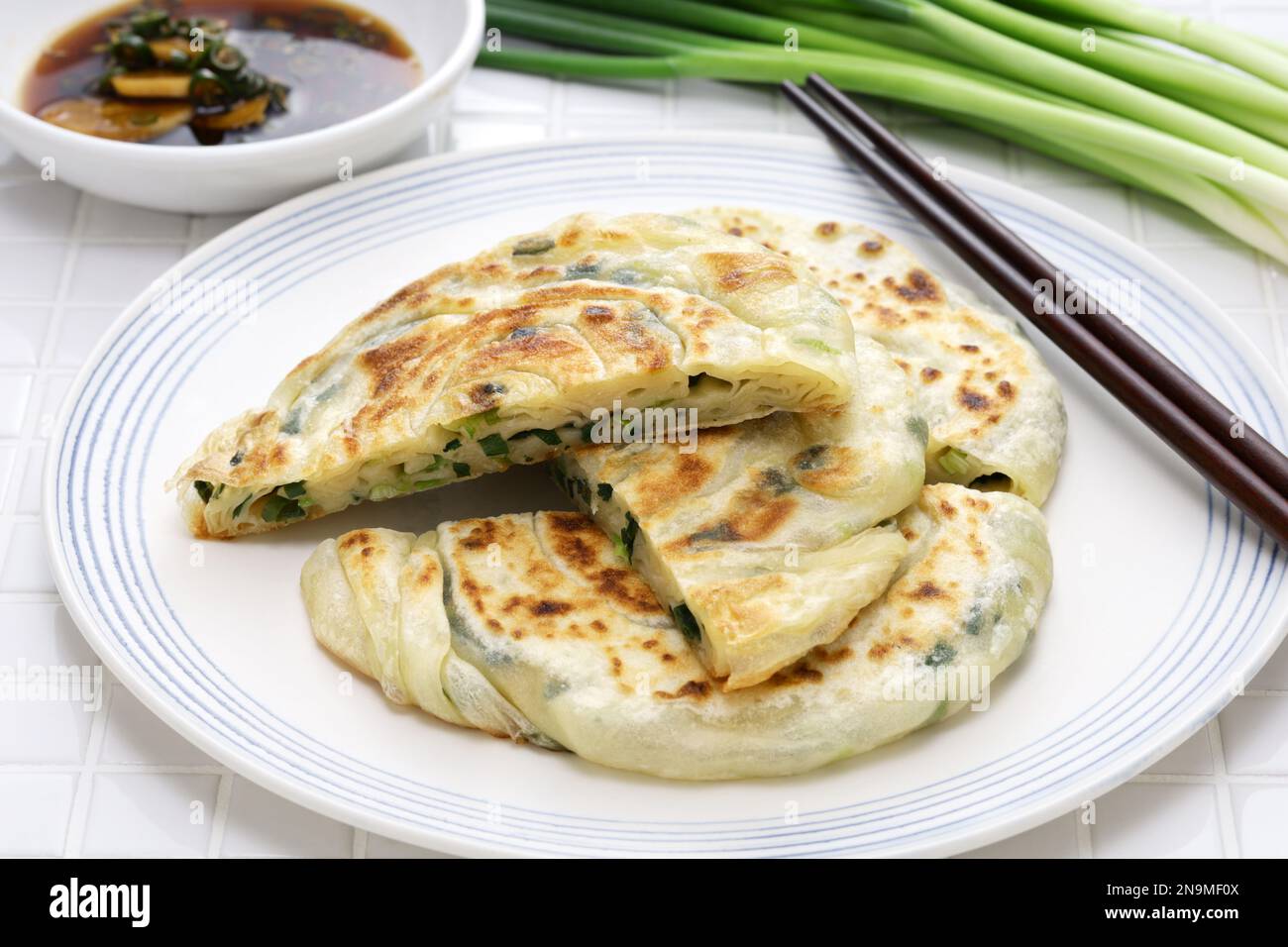 Homemade Chinese green onion pancakes. The inside is layered Stock