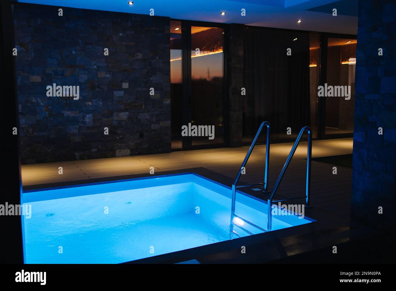 Plunge pool with cold water preparing after relaxing in sauna. Pool is