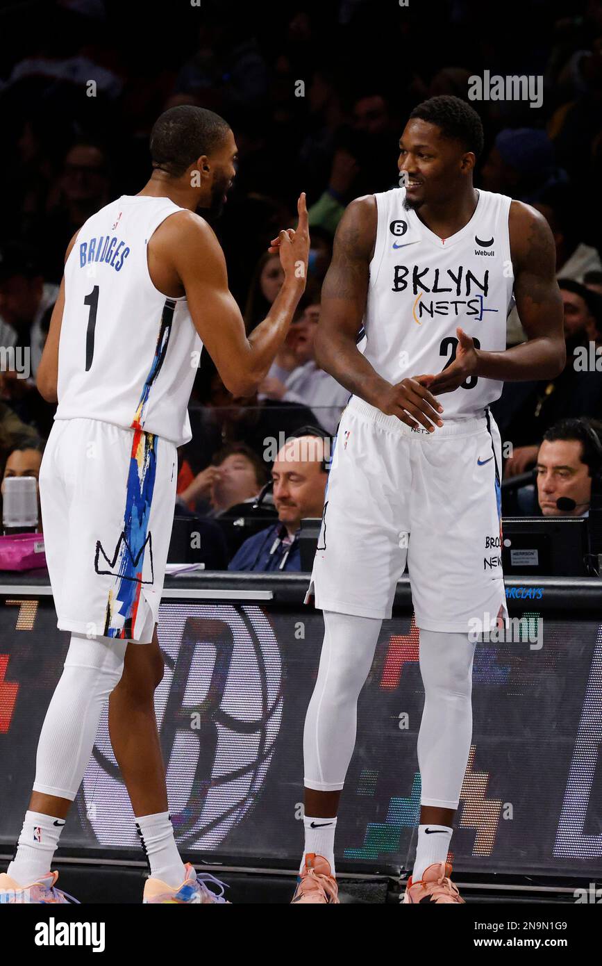 Brooklyn Nets' Mikal Bridges (1) talks to teammate Dorian FinneySmith