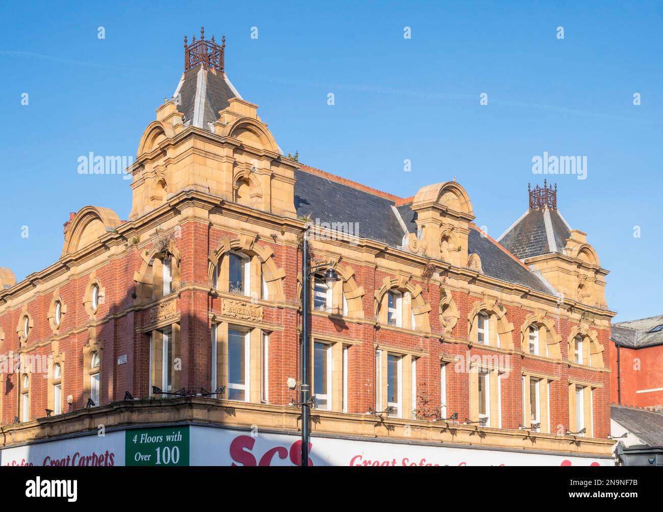 The upper storeys of Mowbray Buildings, Edwardian architecture, now a shop, in Borough Road, Sunderland, England, UK Stock Photo