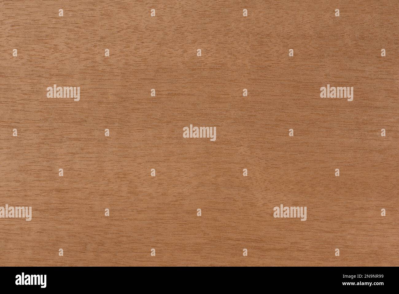 Wood with fine horizontal texture. Anigre wood texture with a reddish brown tint. Exotic wood