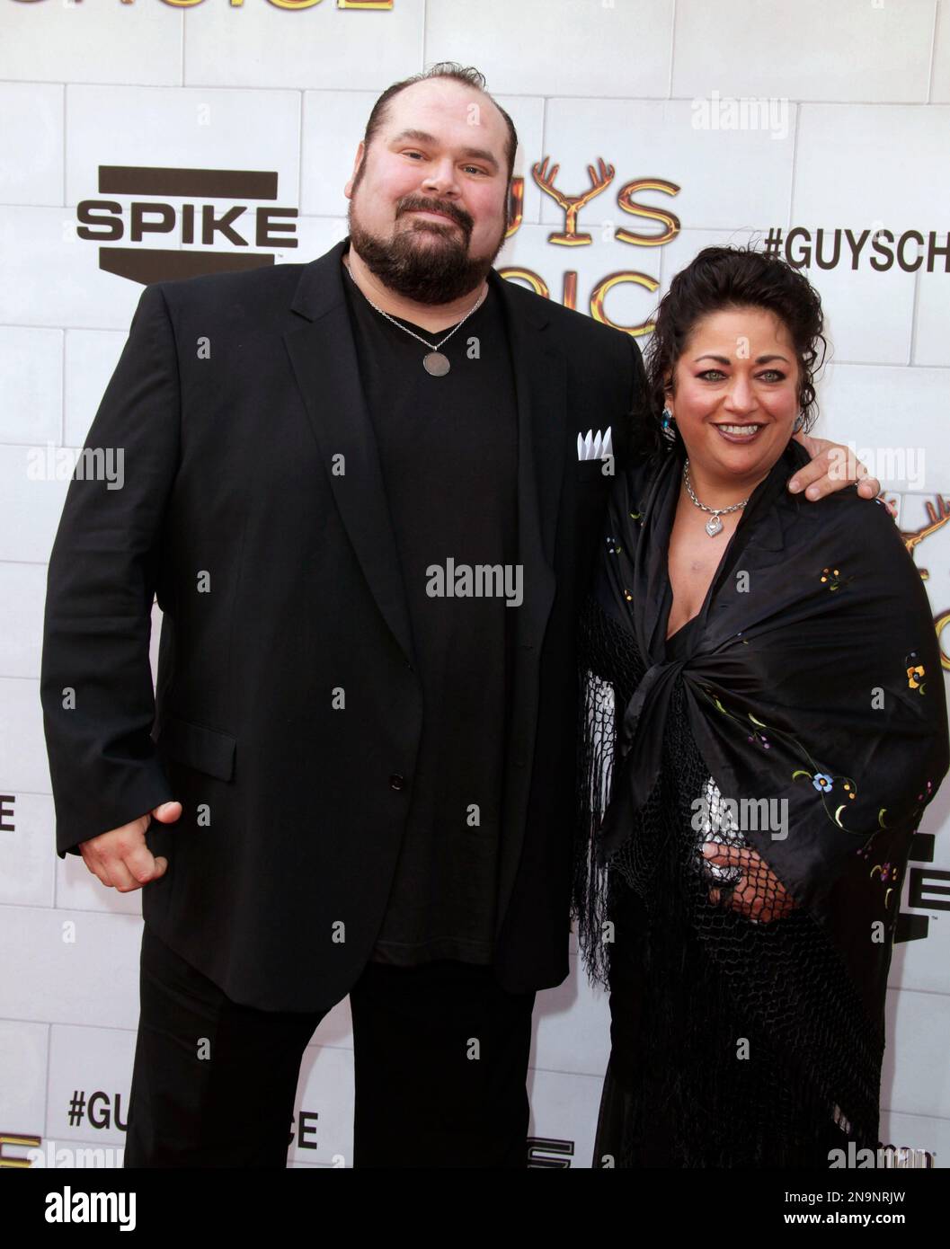 Ric Savage, left, and Rita Savage arrive at the 2012 Guys Choice Awards