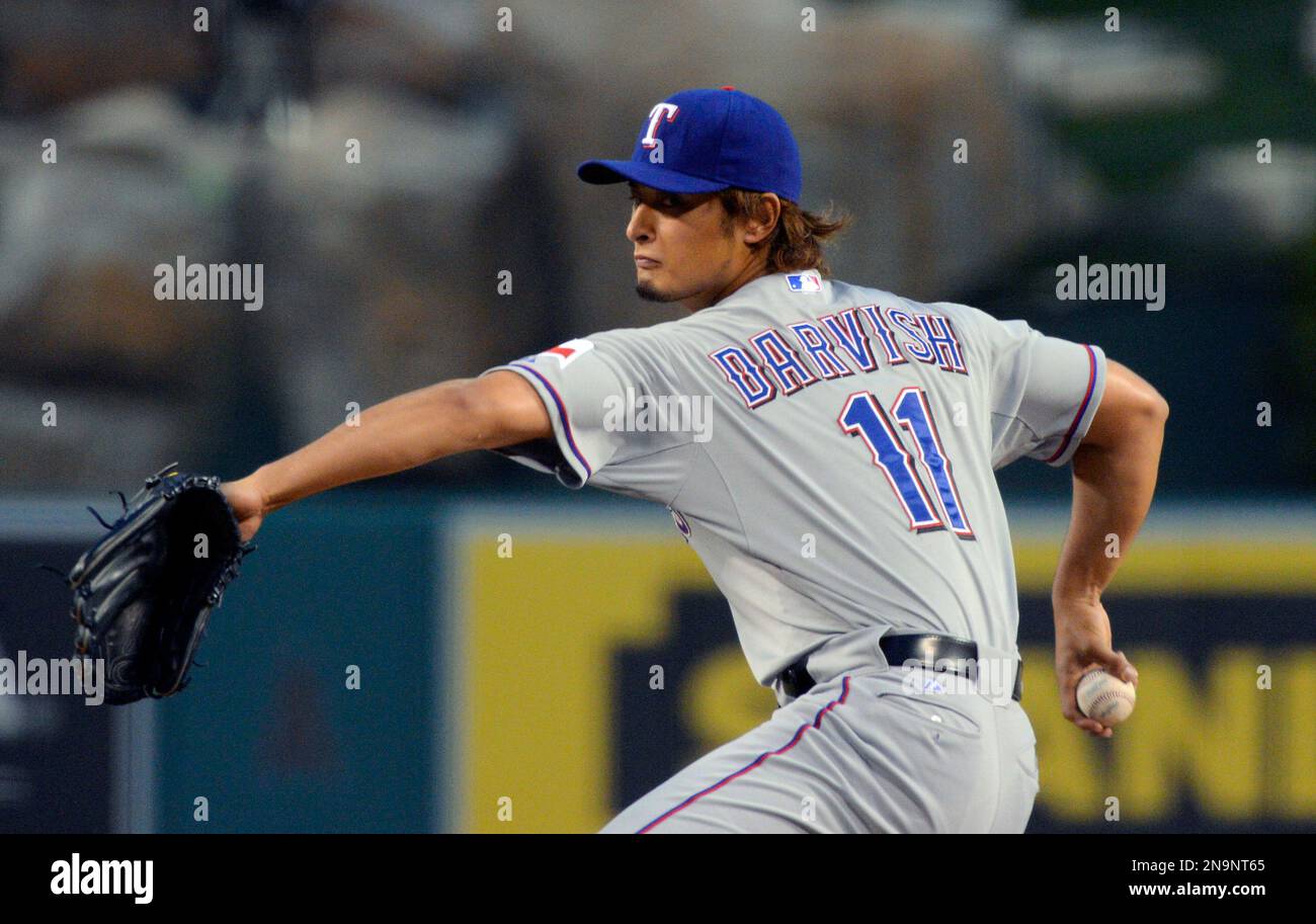 Texas Rangers starting pitcher Yu Darvish, of Japan, throws to the ...