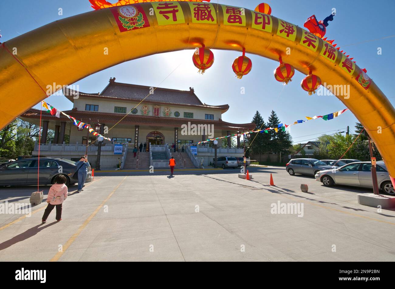 Toronto, Ontario / Canada - May 26, 2013: Building exterior of a Buddies temple with a golden colour arch. Stock Photo