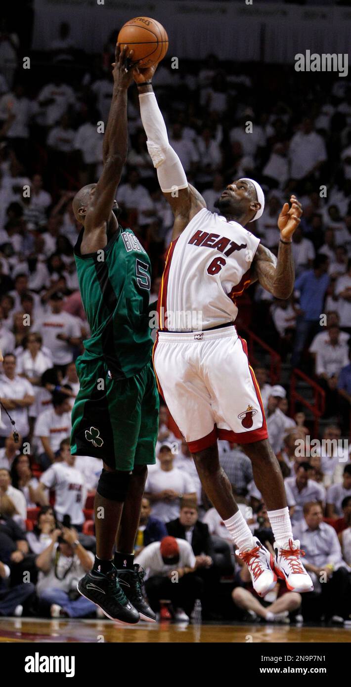 Miami Heat's LeBron James (6) and Boston Celtics' Kevin Garnett (5