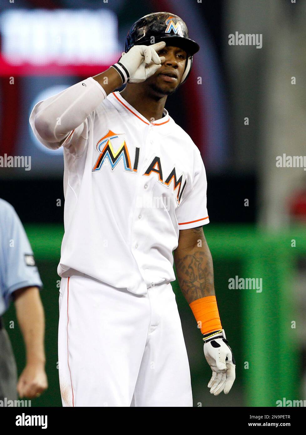Miami Marlins' Hanley Ramirez makes the "lo viste" sign, Spanish for "see  that?" after hitting a double in the first inning of a baseball game  against the Washington Nationals, Tuesday, May 29,