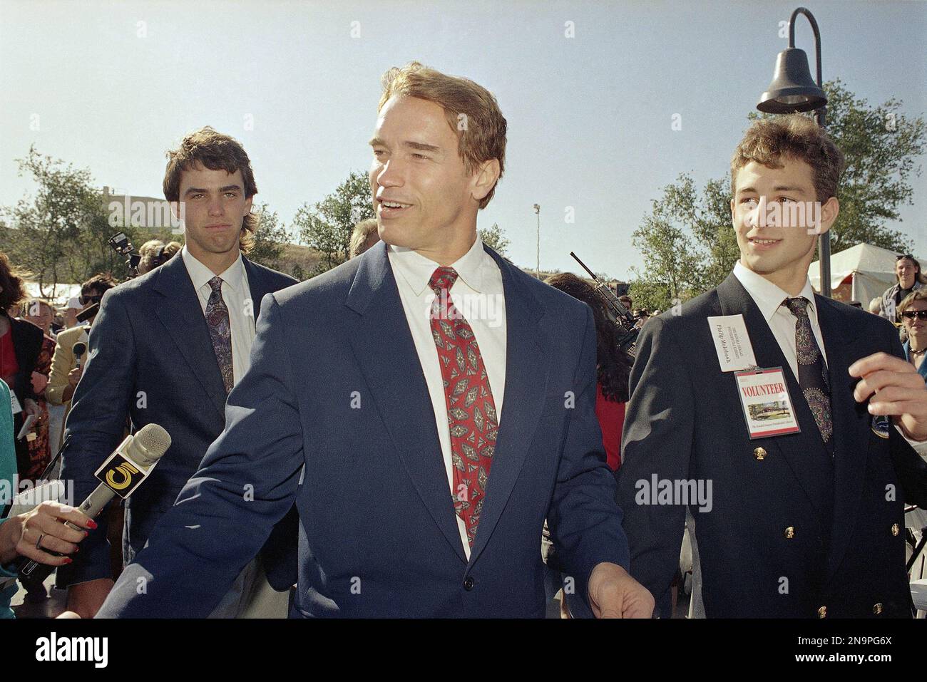 Reagan Library Dedication Actor Arnold Schwarzenegger, center, is escorted to the dedication ...