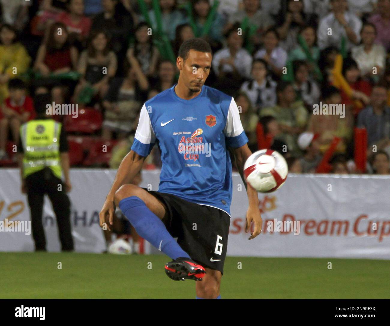 Manchester United's Rio Ferdinand of England kicks the ball during a