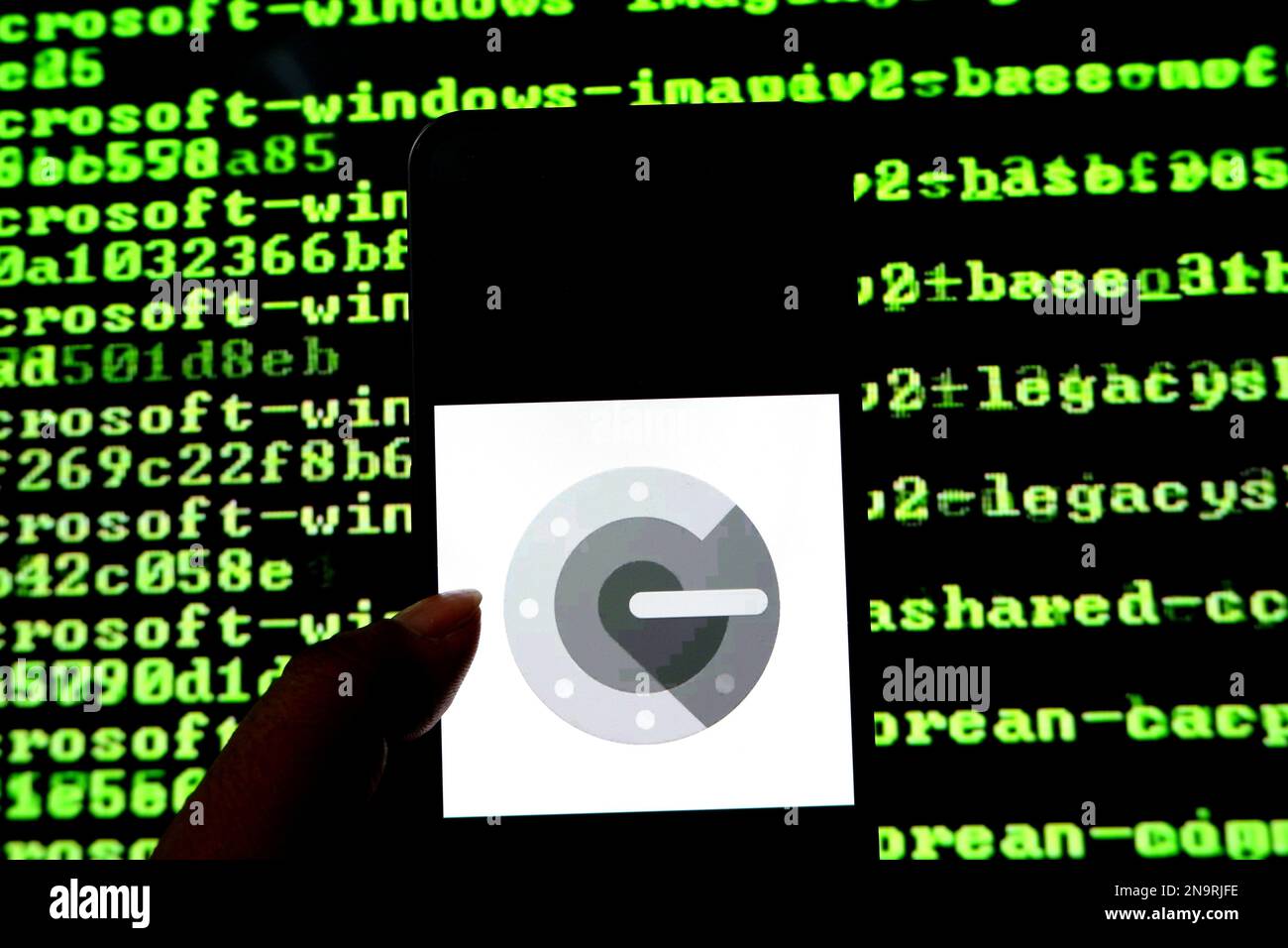 In this photo illustration, a Google Authenticator logo is seen ...