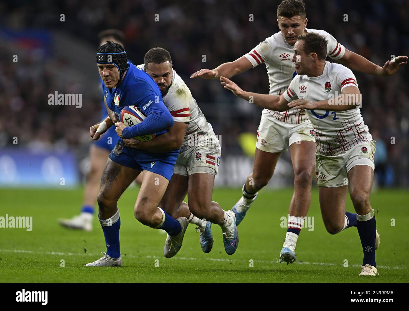 Twickenham, United Kingdom. 12th Feb, 2023. England V Italy, Guinness 6 Nations. Twickenham Stadium. Twickenham. Juan Ignacio Brex (Italy) is tackled by Ollie Lawrence (England) during the England V Italy rugby match in round 2 of the Guinness 6 Nations. Credit: Sport In Pictures/Alamy Live News Stock Photo