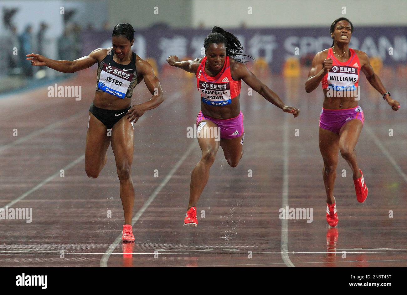 veronica-campbell-brown-center-of-jamaica-crosses-the-finish-line-as