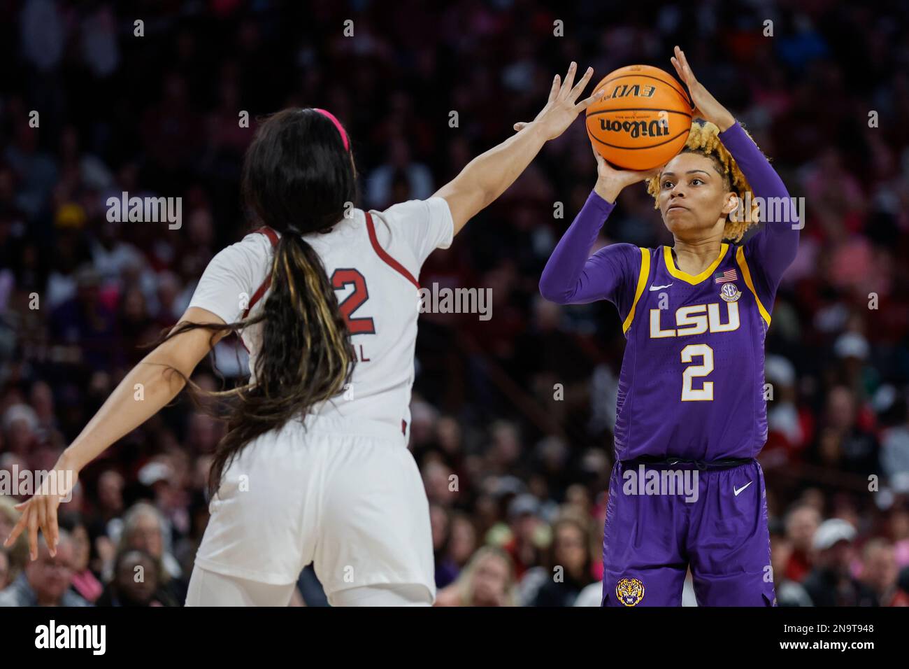 LSU guard Jasmine Carson, right, shoots against South Carolina guard