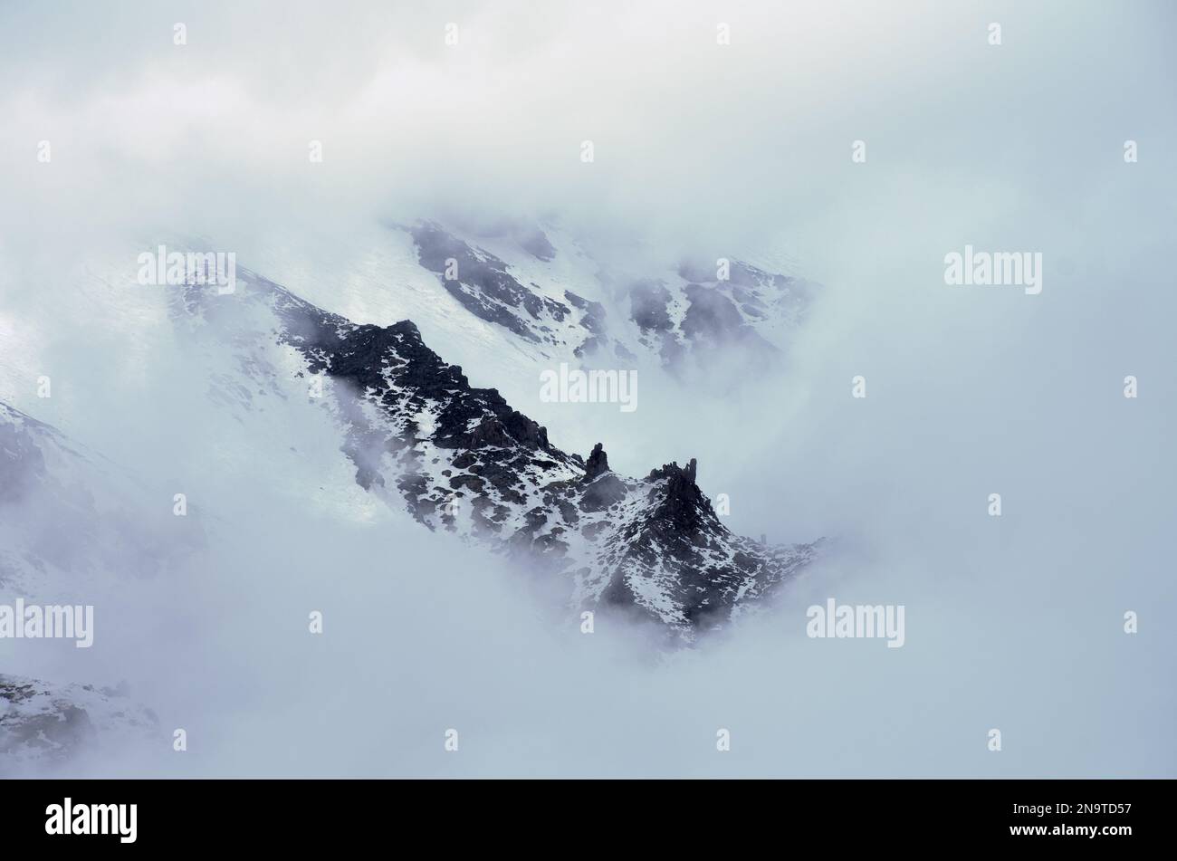mountain ridge snow covered and clouds in Sicily, slope of the &quot;Valle