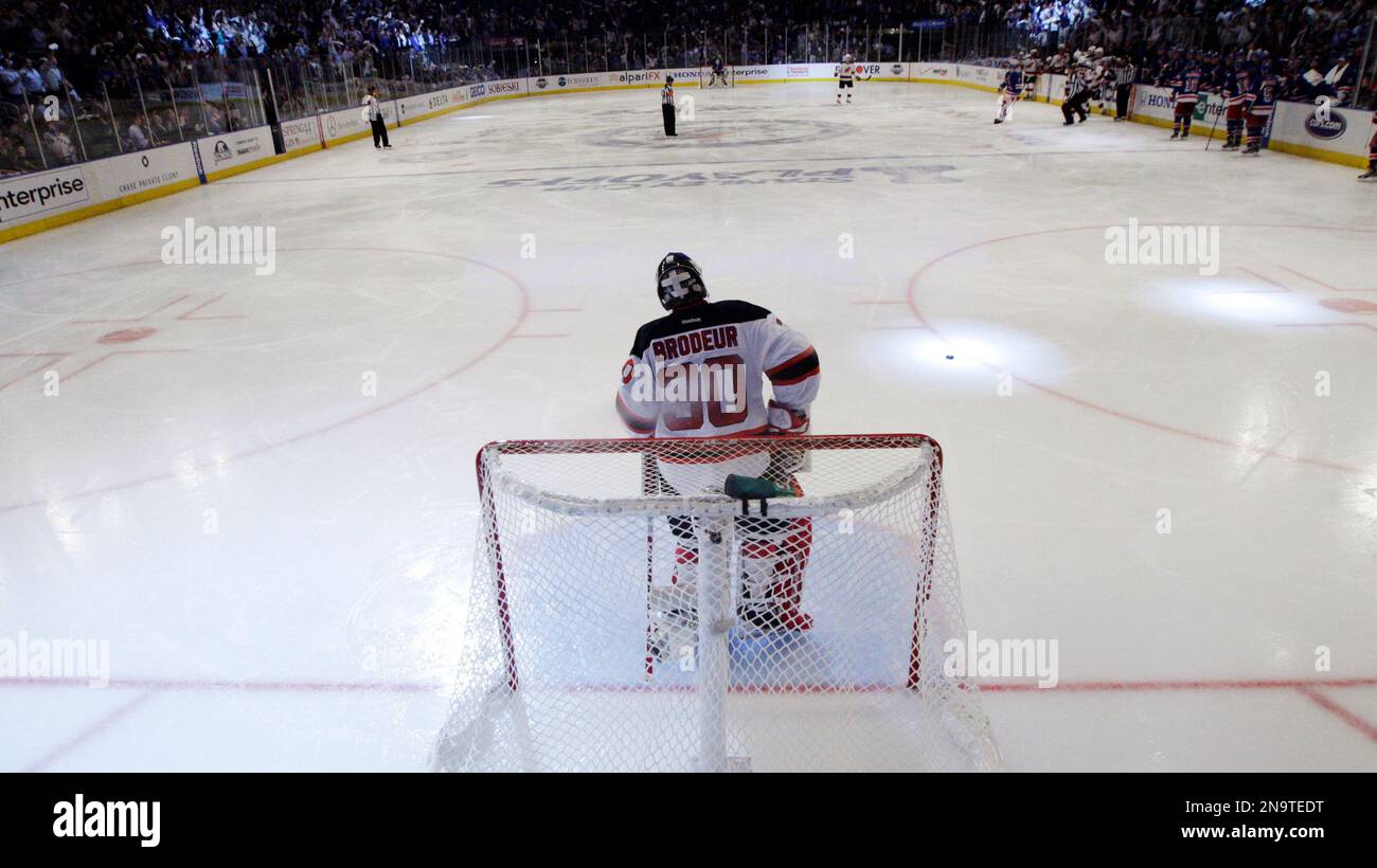 New Jersey Devils goalie Martin Brodeur stands near his net during the